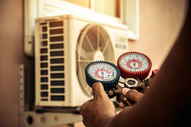 Professional Hvac technician working in Midway, PA